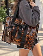 Tortoise printed tote bag with accessories