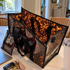 Tortoise printed tote bag with accessories